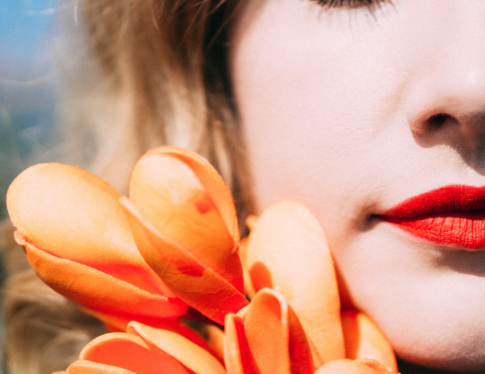 How orange lipstick becomes a bright accent in your look and helps find the perfect shade.